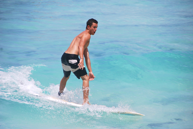 Standing up and riding the waves at Freights Bay Barbados!